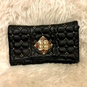 BCBG clutch with logo turn-lock closure